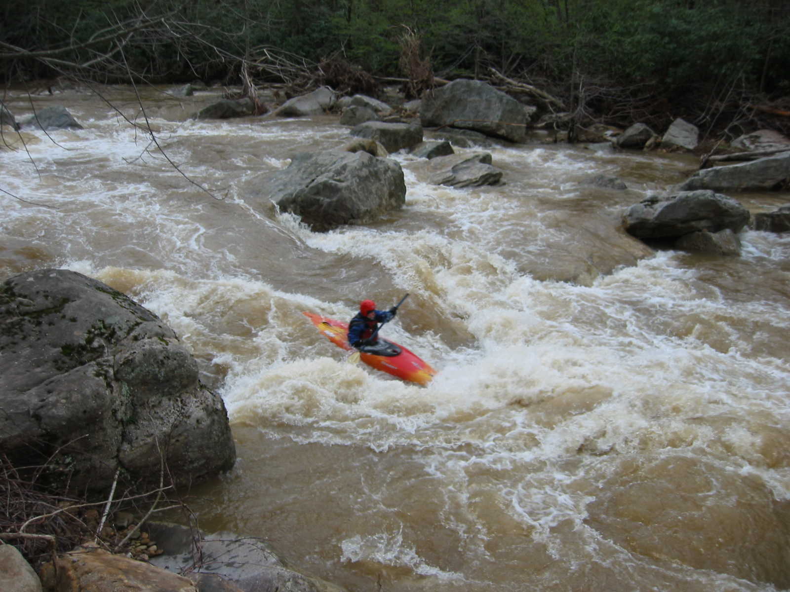Bob Maxey hitting the main hole in the big South Fork rapid (Photo by Lou Campagna - 4/26/04)