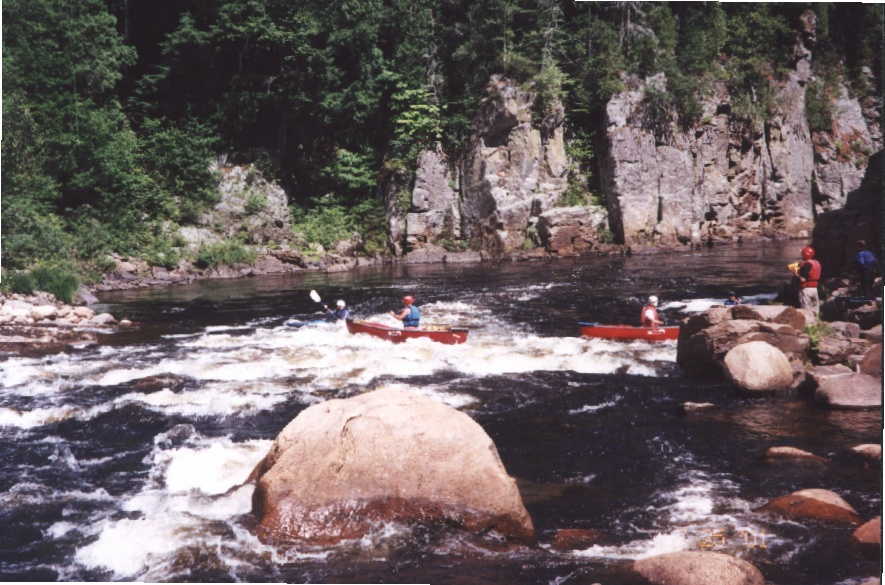Rick Koller surfing in take-out rapid (Photo by Keith Merkel - 7/25/01)